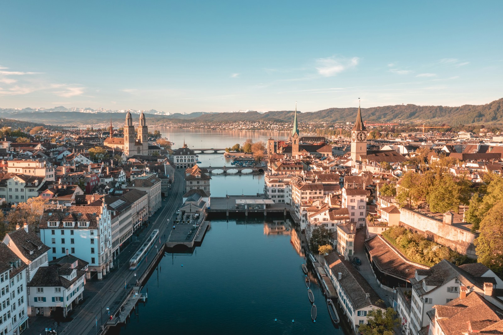 Zurich old town along the Limmat, including Grossmünster and Fraumünster.