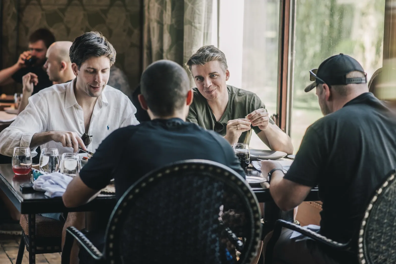Teammates sharing a meal around a table during the Buenos Aires offsite.